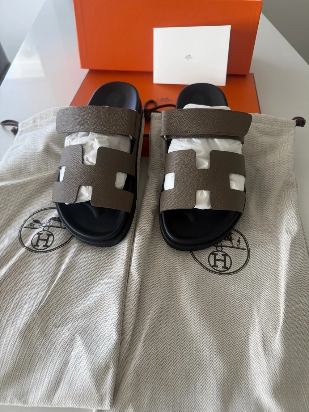 Hermes Women’s Oran Slide Sandals in Taupe and Black